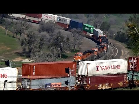 BNSF Four Diesels power a Double stack container rake at Tehachapi Loop in California