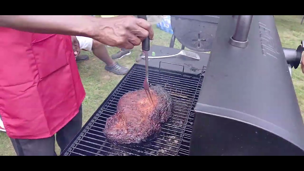 Video: Barbeque contest competitors prepare food at Auburn block party