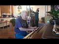 Ray Kiker  playing piano at Rosalind Coffee on the Garland Square