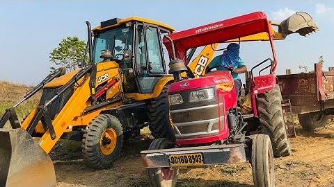 Jcb 3dx Eco Xpert Machine Loading Mud In Mahindra Yuvo 415 DI Tractor With Swaraj Tractor