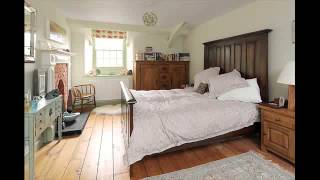 Ashley Trinell Tall Pier in Brown trinell bedroom furniture