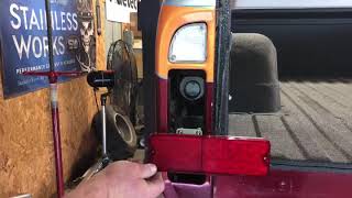 Hidden tail light fuel filler