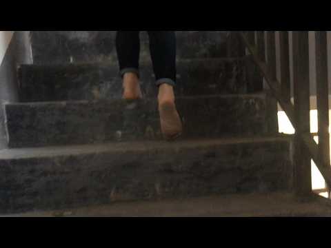 Jung went barefoot into an abandoned building, and dust stuck to her soles