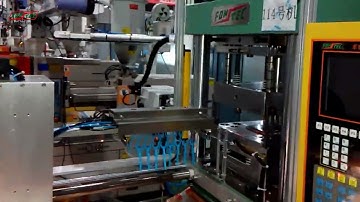 How high quality Dental floss processing on vertical injection molding machine with auto arm line.
