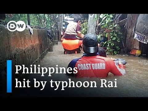 100,000 evacuated as Super Typhoon Rai makes landfall in the Philippines | DW News