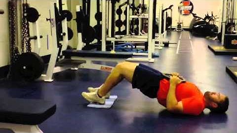 Towel Eccentric Hamstring Curls