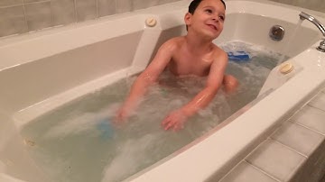 Caleb in the new bathtub