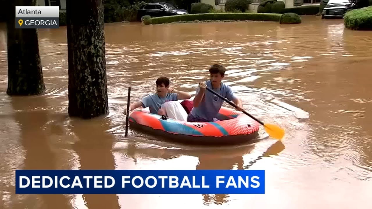 Football fan uses raft to rescue friend from Hurricane Helene flooding ...