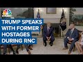 President Donald Trump speaks with former hostages during 2020 Republican National Convention