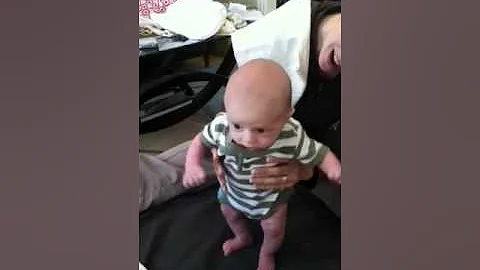 Kellen standing with help