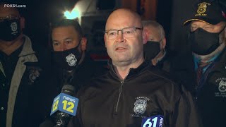Co-workers and friends hold a vigil for UPS worker murdered on the job