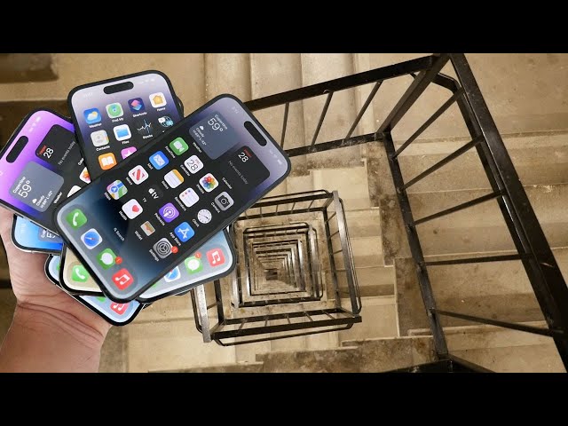 Dropping a Stack of (7) iPhone 14 Pro's Down Crazy Spiral Staircase 300 Feet - Will They Survive? class=