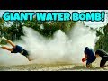 GIANT WATER BOMB Vs. NERF BLASTERS!