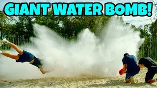 GIANT WATER BOMB Vs. NERF BLASTERS!