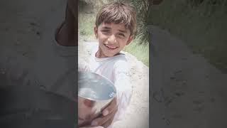 A Little Child Serving Sabeel in Loving Memory of Imam Hussain (A.S.) The Spirit of Muharram