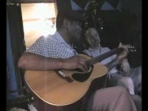 Blues legend Dave Myers performs in his living room