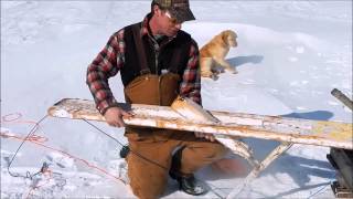 setting a gill net under the ice