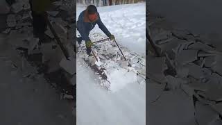 Snow road surface ice clearing- Good tools and machinery make work easy