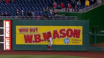 Bourjos jumps at the wall to make a catch