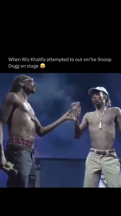 Snoop Dogg vs. Wiz Khalifa: The Epic Smoke Battle! 😳🚬 #shorts #snoopdogg #wizkhalifa #battle #rap