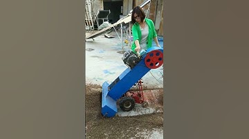 Self moving grain scraper, remote control for forward and backward movement,