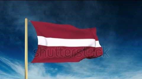 Latvia flag slider style. Waving in the wind with cloud background animation Stock video by