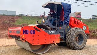 Road rollers are under construction on the road along the dike - Kids Picture Show