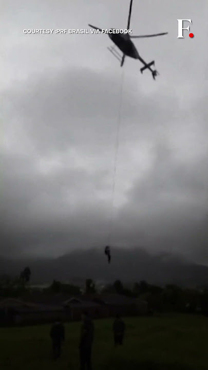 Brazil: Dramatic Mother And Child Rescue Caught On Cam | Subscribe to Firstpost