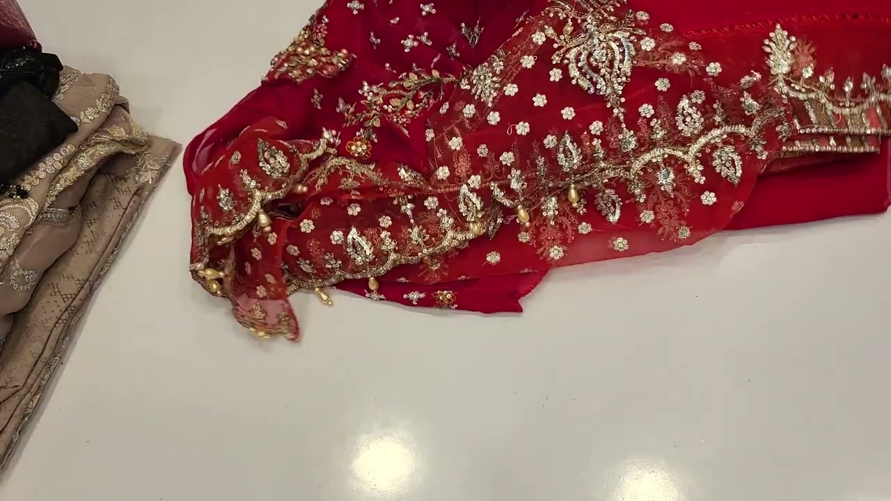 ORIGINAL pakistani pure chiffon heavy zary partywear suits in hyderabad India.7995319085