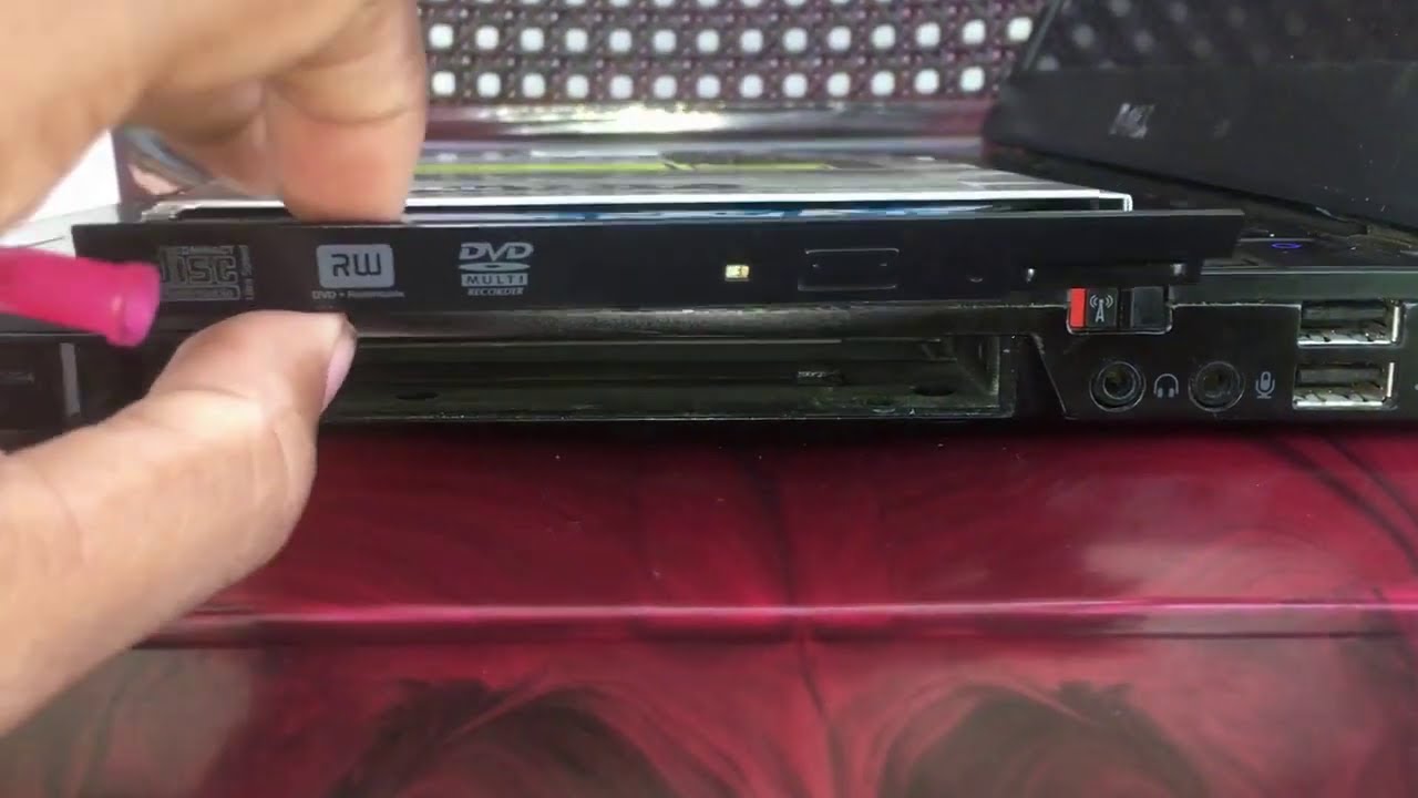 eject-stuck-cd-dvd-from-laptop-100-working-youtube