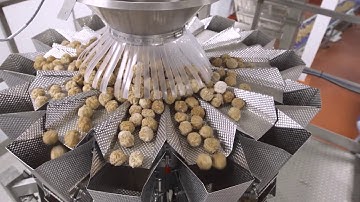 PrimoCombi® multihead weigher dispensing meatballs into vertical form and sealed pouches
