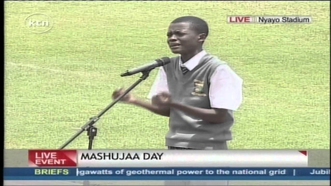 Juma Idi Juma recites a poem at Masujaa Day celebrations
