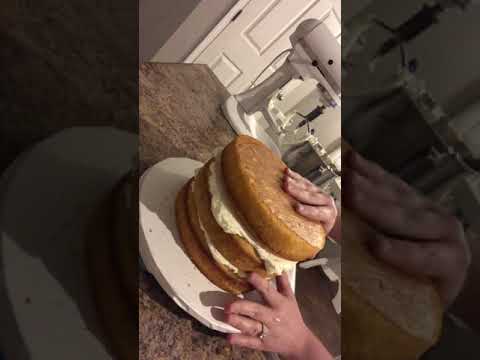 How to assemble and crumb coat a cake - YouTube