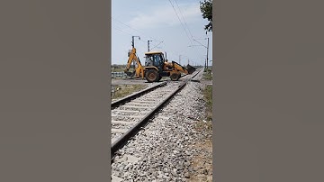 JCB on the railway line 😭😭 #shorts #youtubeshorts #train #railway #tractor #truck #jcb