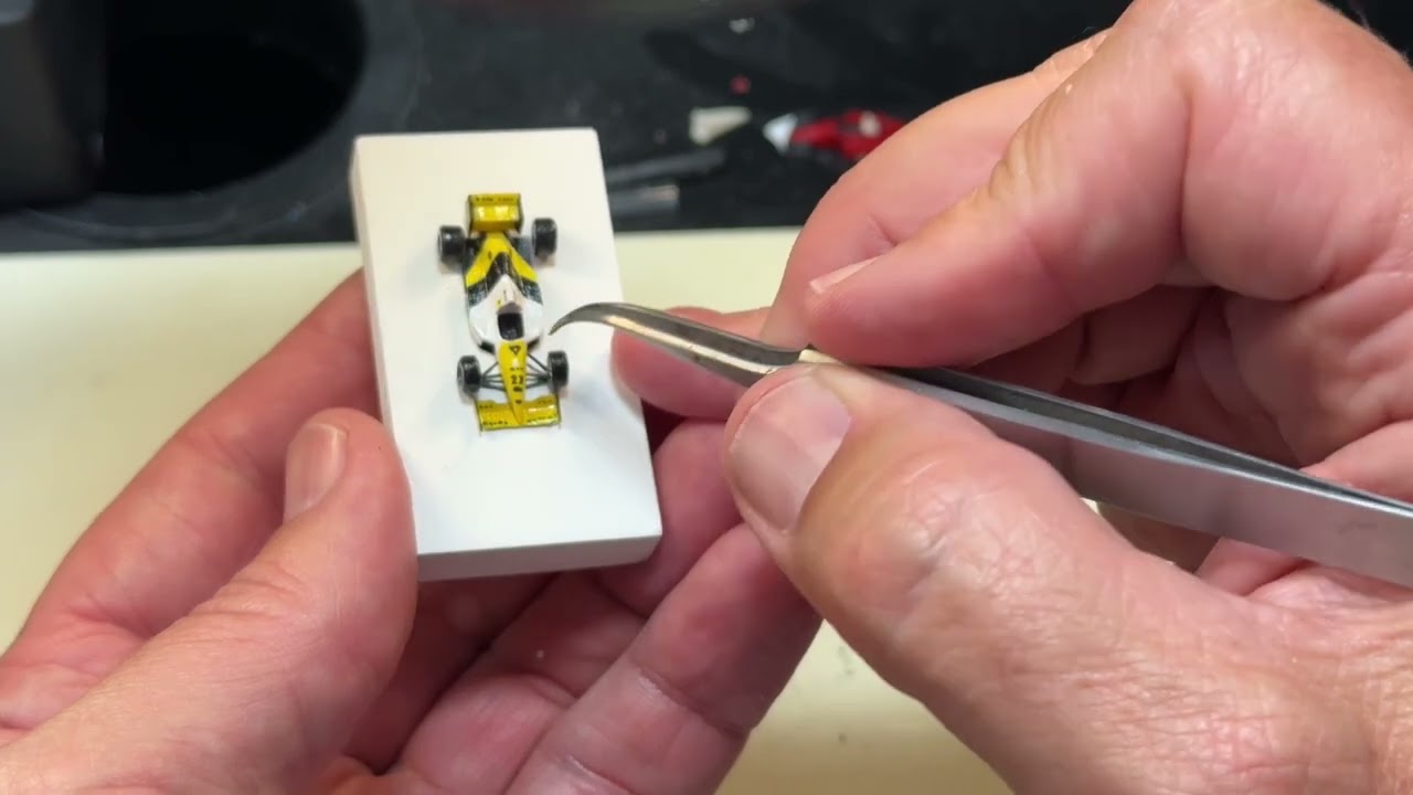 Suspension arms and sculpting a Jordan F1 and Porsche RSR.