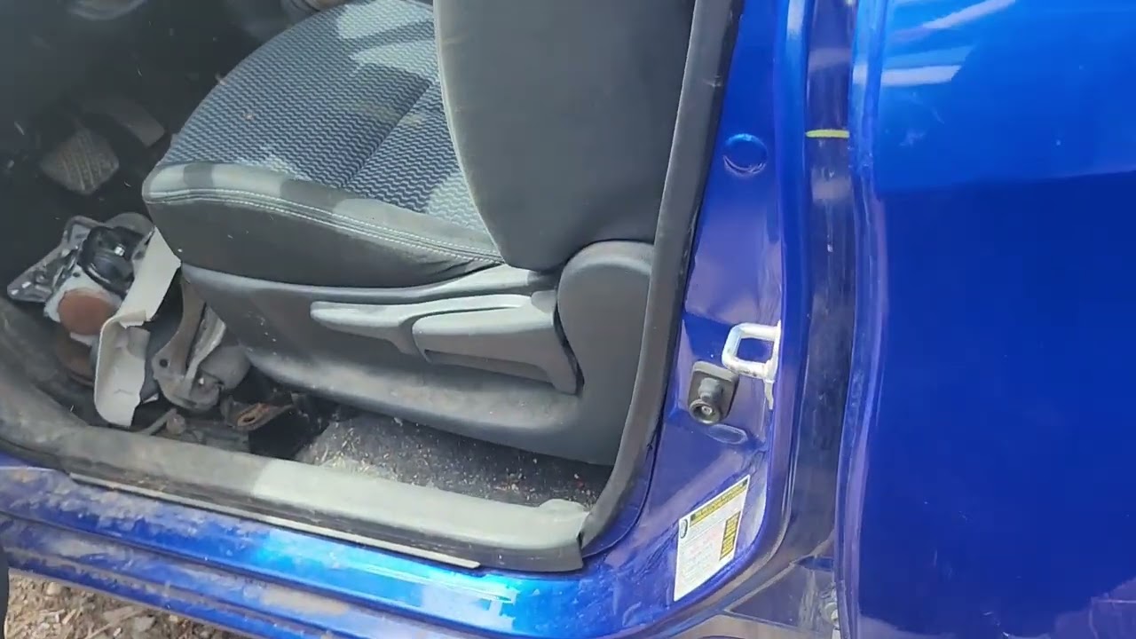 where to find the paint code in a nissan versa