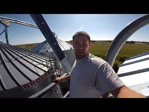 Nobody got hurt!! Moving our 117 foot, 7,300 pound conveyor to the top of our grain bins!