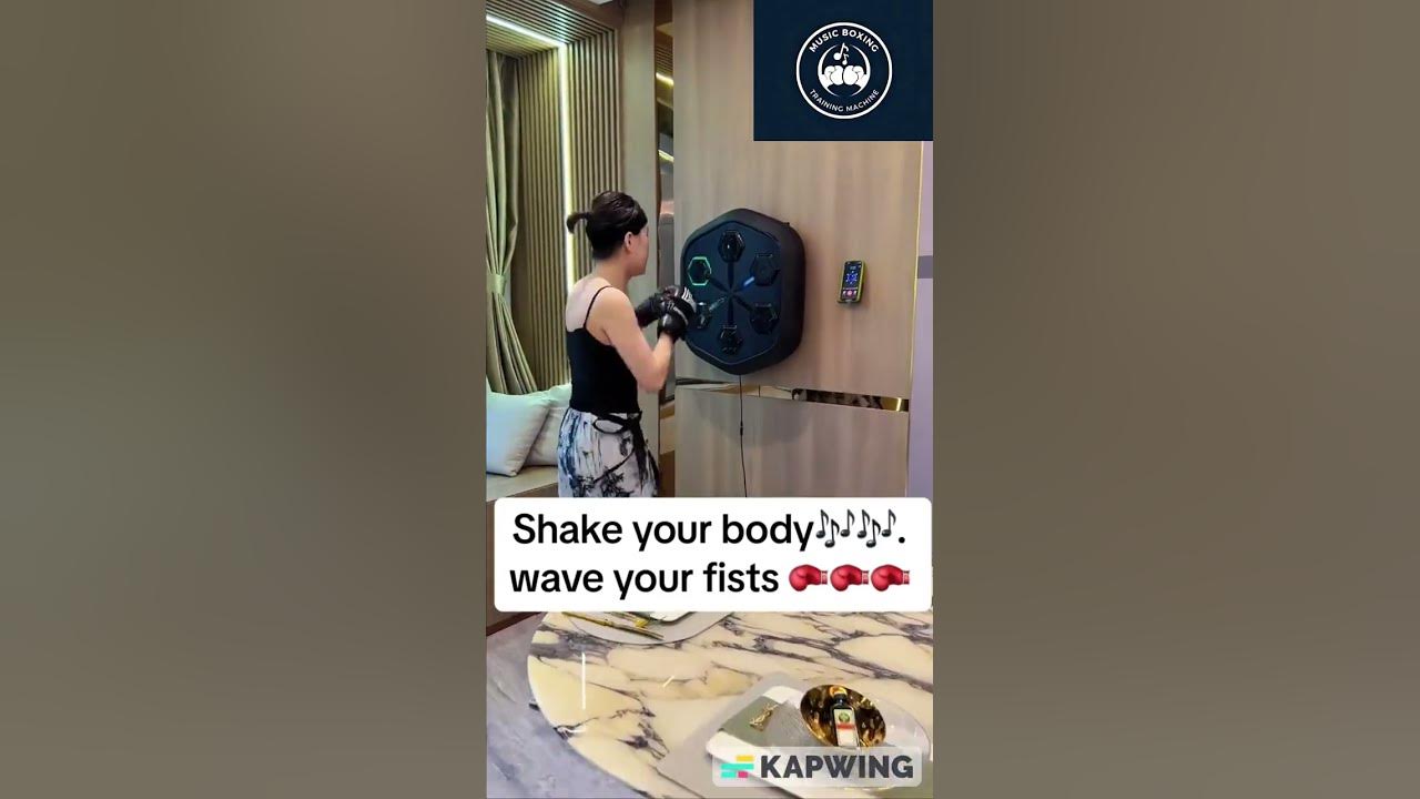 "Unleash your rhythm with the Music Boxing Machine! 🎶🥊