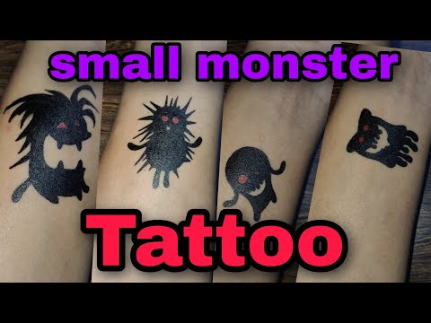 Premium Vector | Tribal symmetrical monster black tattoo