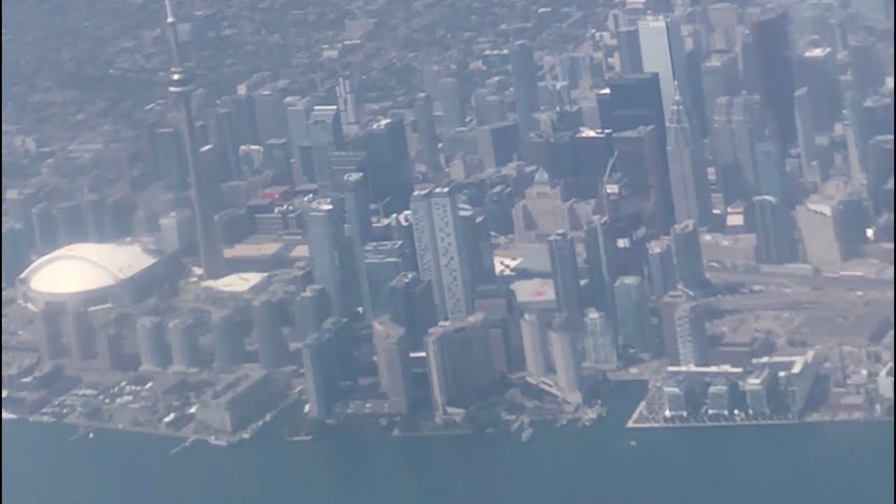 Airplane Take off From Downtown Toronto  YTZ- nice view from window seat .