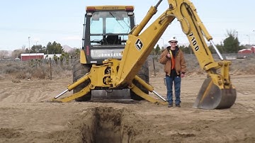 Backhoe Digging By Operator Deshazo