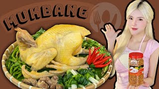 Blond mukbang boiled chicken dipped in salt and chili sauce