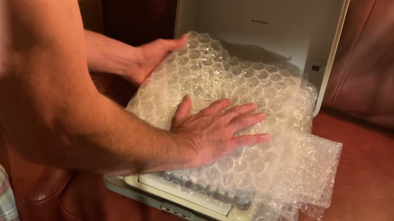 Preparing Olympia SM typewriter for shipping