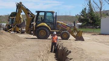 CAT Backhoe Trench Skills By Operator Luna