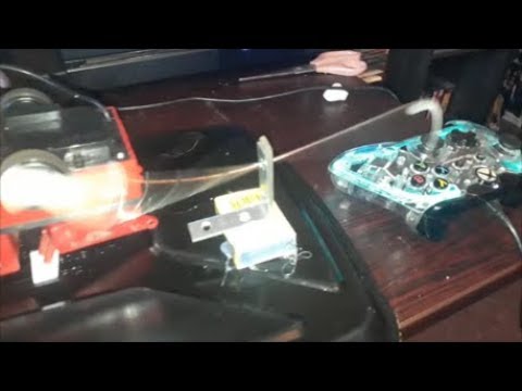Prototype game controller button hitter - YouTube