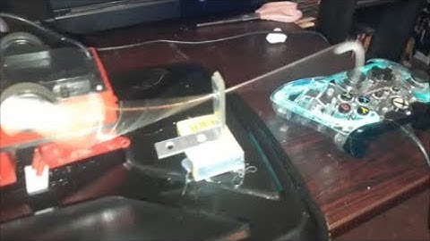 Prototype game controller button hitter