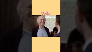 Larry David with the Ugly Seat in a Restaurant