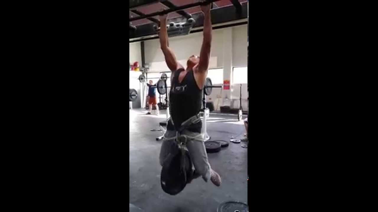 Pullups w 45 lb plate!  How to perform a pull-up with a 45lb plate!