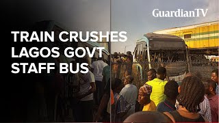How Lagos State BRT bus was crushed by a moving  train in Lagos