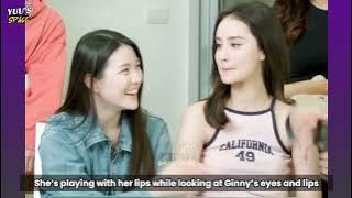 Jayna playing her lips while looking at Ginny’s lips